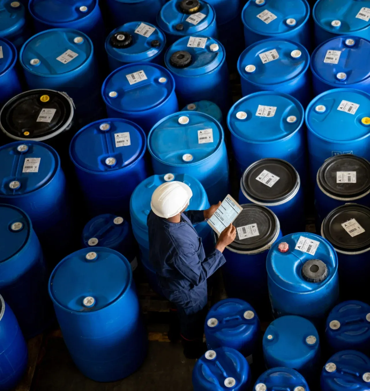 SoleChem manufacturing — chemical drums in warehouse